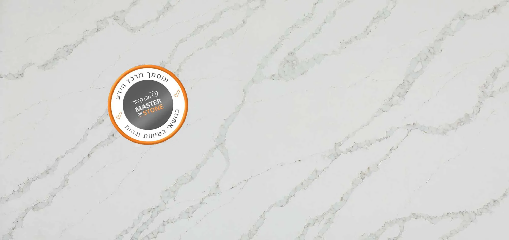 Caesarstone 8103 Calacatta Nobella quartz surface featuring the Master of Stone Health & Safety Training Centre Certified stamp.